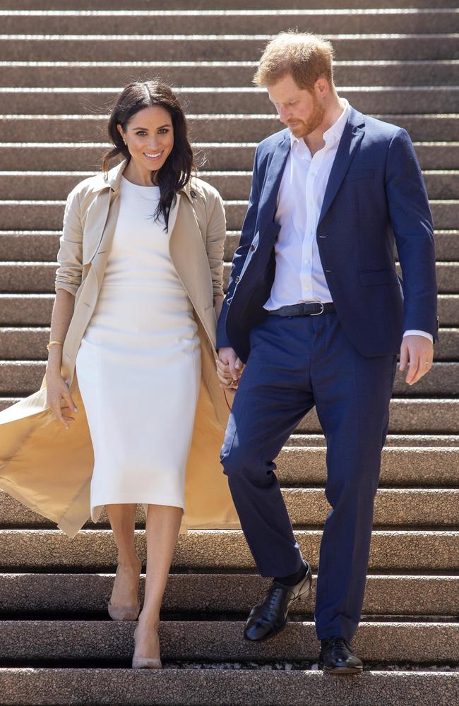 The royal couple walk down the steps of the Opera House. Picture: Justin Lloyd.