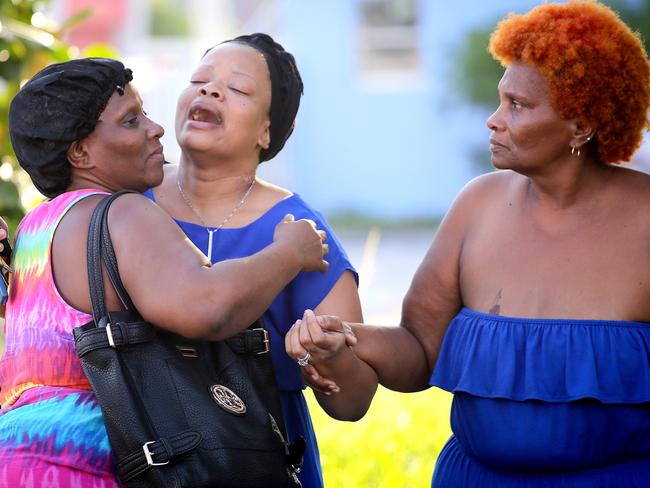 Bennae Robinson (centre), the aunt of shooting victim Kevin Richardson, 30, reacts to the death of her nephew, who was gunned down outside an apartment complex in Miami, Florida. Picture: Angel Valentin/Getty Images/AFP