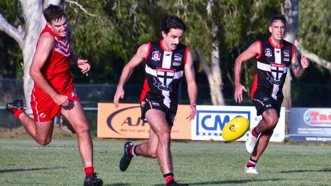 Toughness and tenacity filled the air of the eastern Swans home ground Saturday as the team rallied to take down the Northern Saints in a game played in honour of the late Bob Inkson. Picture: Eastern Swans