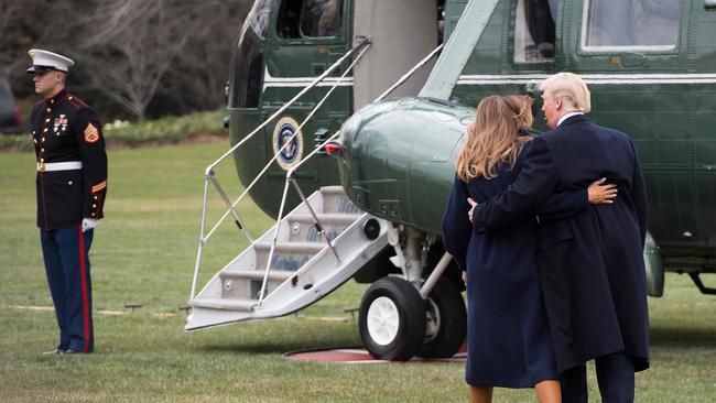 US President Donald Trump walks with First Lady Melania Trump. Picture: AFP
                        <a capiid="68ef4a19d7bd763009558a7d3c10454f" class="capi-video">Trump mum on Mueller, Melania stumbles</a>