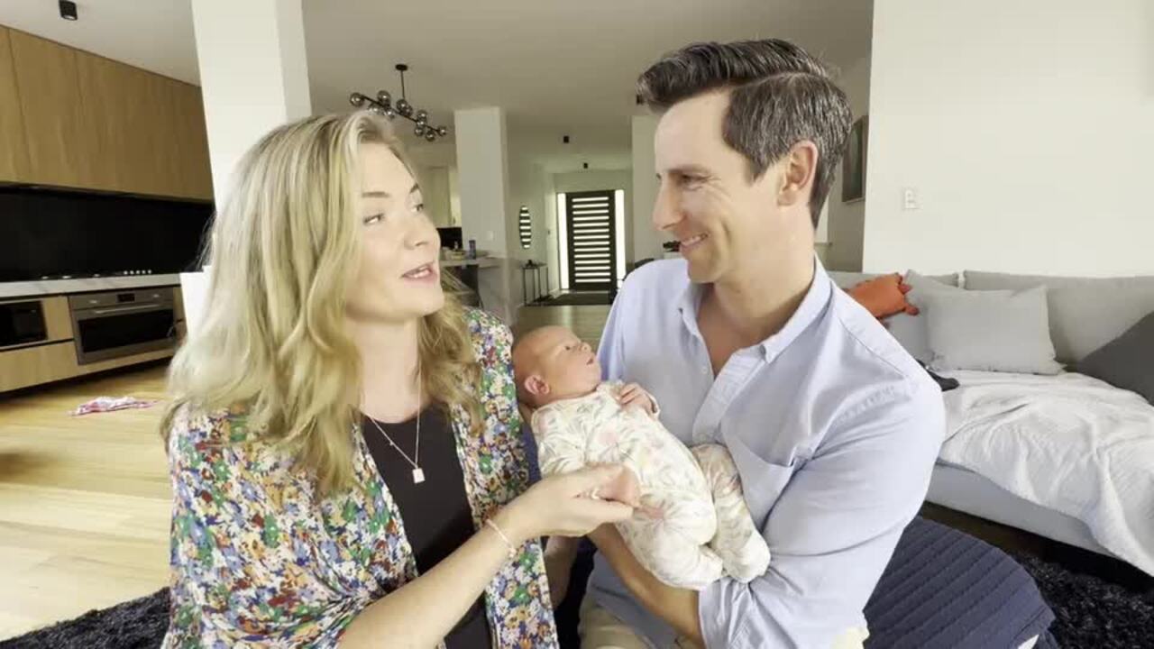 Briony Benjamin and Byron Fay with baby 'Alfie', who was born during cyclone