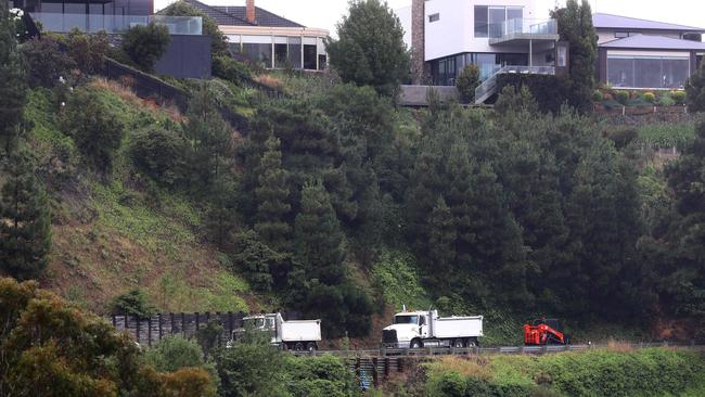 Diggers and trucks working on Deviation Rd from Fyansford to Newtown, which is closed closed because of a landslip. Picture: Alison Wynd