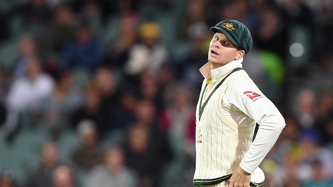 Australian captain Steve Smith reacts following a dropped catch from the bat of England's Dawid Malan on Day 4 of the Second Test match between Australia and England at the Adelaide Oval in Adelaide, Tuesday, December 5, 2017. (AAP Image/Dave Hunt) NO ARCHIVING, EDITORIAL USE ONLY, IMAGES TO BE USED FOR NEWS REPORTING PURPOSES ONLY, NO COMMERCIAL USE WHATSOEVER, NO USE IN BOOKS WITHOUT PRIOR WRITTEN CONSENT FROM AAP