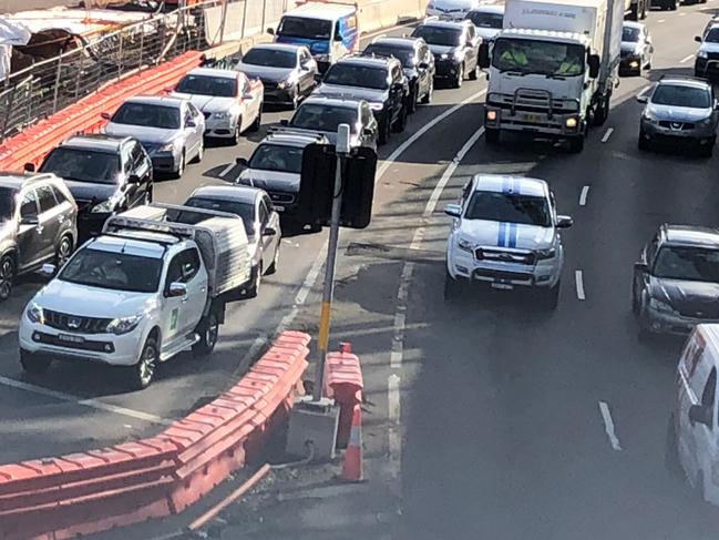 Traffic lights at the intersection of Warringah Rd and Forest Way will lead to some delays for peak hour traffic heading west towards Chatswood.