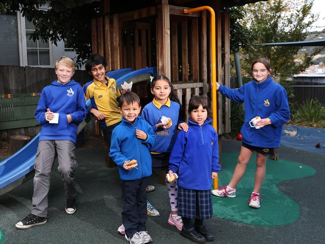 Albuera Street Primary students, from left,William Powell, 11, Mohammed Alodhaibee, 12, Judah Irawan, 5, Turlican Jones, 8, Greta McDonald, 4, and Lucia Gasperini, 10, enjoy the school’s healthy canteen options. Picture: Nikki Davis-Jones