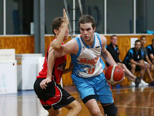 Sam Ellis competes for the Cairns Marlins Under 18 boys Division One team in the Queensland Junior Basketball tournament, held at Early Settler Stadium, Manunda. Picture: Brendan Radke