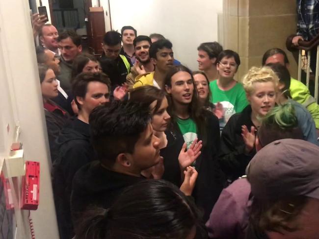 Protesters blocking the entrance to a talk by Bettina Arndt.