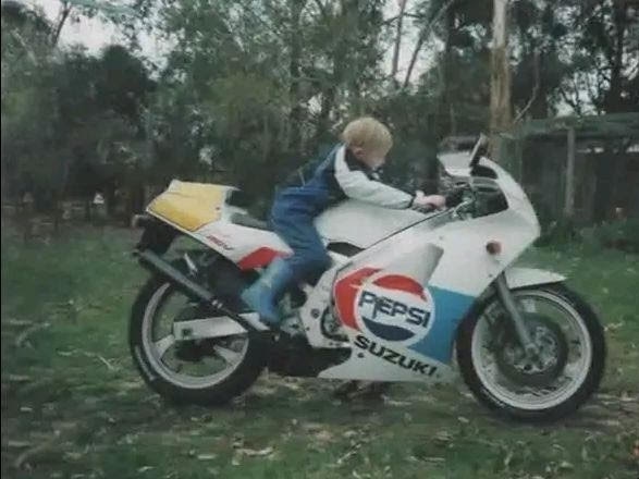 Mr Pickering photographed sitting on his dad's bike as a young kid. Photo: supplied.