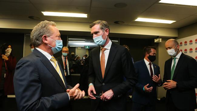 Andrew Forrest, left, and NSW Premier Dominic Perrottet, centre, talk after a media event last October. Picture: NCA NewsWire / Gaye Gerard