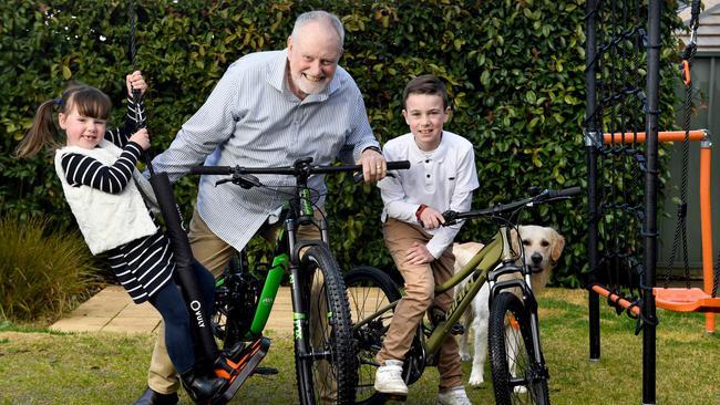 Ian Blue, 71, with their dog Buddy and his grandchildren Imogen, 5, and Jack, 10. Picture: Tricia Watkinson