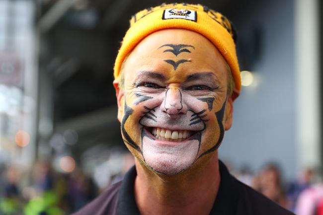 BRISBANE, AUSTRALIA - OCTOBER 24: Tigers fans pose before the 2020 AFL Grand Final match between the Richmond Tigers and the Geelong Cats at The Gabba on October 24, 2020 in Brisbane, Australia. (Photo by Chris Hyde/AFL Photos/via Getty Images)