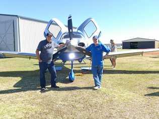 SHOW STOPPER: The regional director for Australia and South East Asia Cirrus Aircraft, Graham Horne, left, with Grafton Aero Club president Kevin Wilson and the company's SR22 model, which has been customised to cope with Australian conditions. Story page 6. Picture: Tim Howard