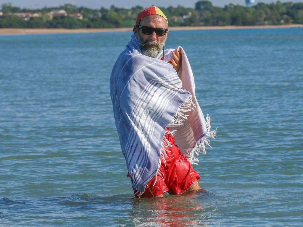 Surf Lifesaver Wayne McMahon endures a Top End Cold snap on Casuarina beach. Picture: Glenn Campbell