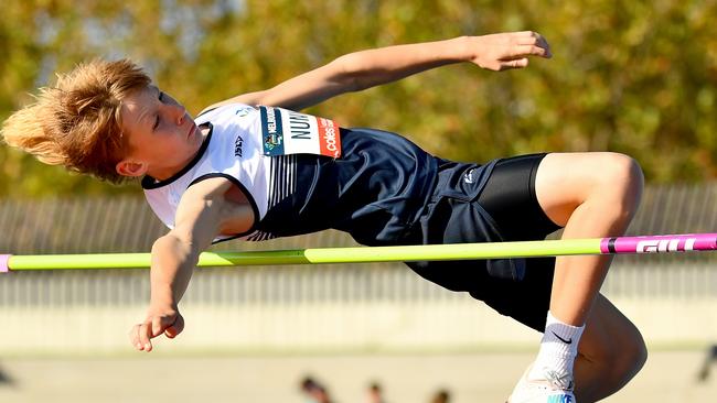 Cooper Nunn (VIC) competes in the Boys U13 High Jump.