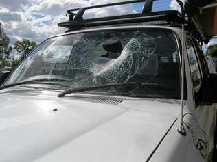 CLOSE CALL: A family was lucky to survive after a brick fell from an oncoming truck and smashed through two windscreens on the Warrego Highway near Miles on Thursday. Picture: QPS