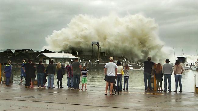 Coffs Harbour Marina cops a pounding at it's breakwall / Picture: Frank Redward