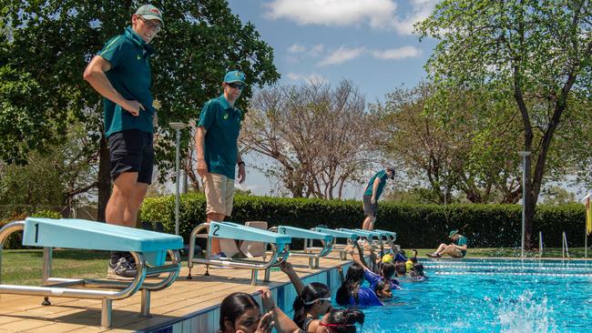 Mack Horton and Michael Faccin as Olympians and scholarship coaches run training sessions for Katherine youth at RAAF Base Tindal. Picture: Pema Tamang Pakhrin