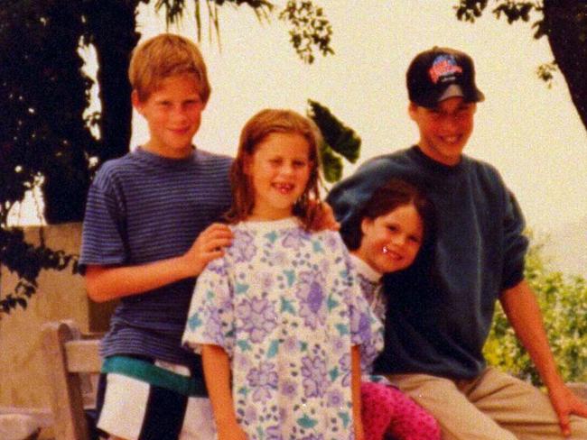 A 1996 holiday snap shot of Prince Harry, Princess' Beatrice and Eugenie and Prince William.