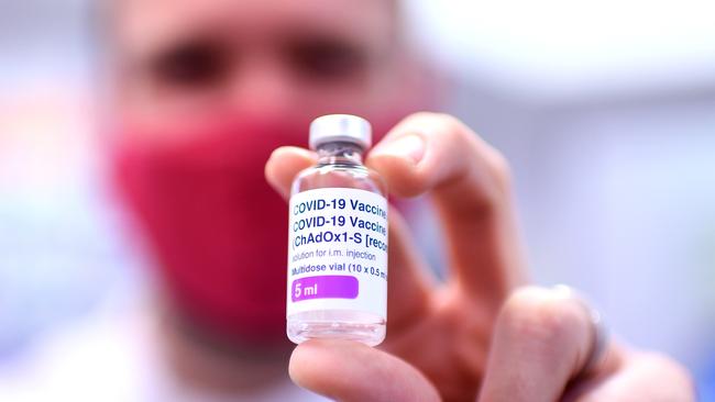 Pharmacist holds a vial of the AstraZeneca Covid-19 vaccine. Picture: NCA NewsWire / Dan Peled