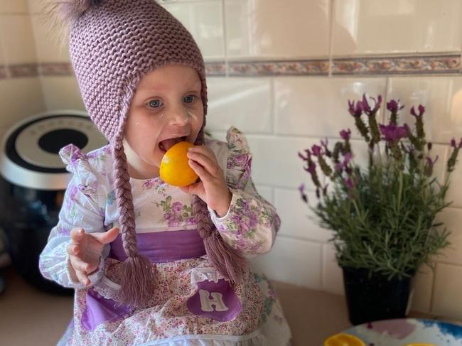 This is holly licking the orange while baking she is such a cheeky little monkey. <b><a href="https://www.dailytelegraph.com.au/newslocal/blacktown-advocate/vote-help-us-find-the-cheekiest-toddler-in-nsw/news-story/9ae7eb32bd93be85a472b448d0c19dda">VOTE HERE </a></b>