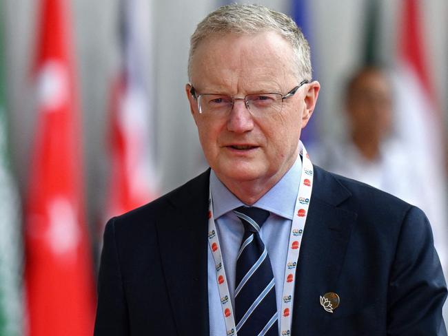 The Reserve Bank of Australia Governor Philip Lowe leaves after attending the G20 Finance Ministers, Central Bank Governors (FMCBG) and Finance & Central Bank Deputies (FCBD) meetings, at the Mahatma Mandir in Gandhinagar on July 17, 2023. G20 finance ministers and central bank chiefs opened talks on July 17 discussing debt restructuring deals, multilateral bank reform and finance to tackle climate change, aiming to bolster a sagging global economy. (Photo by Punit PARANJPE / AFP)