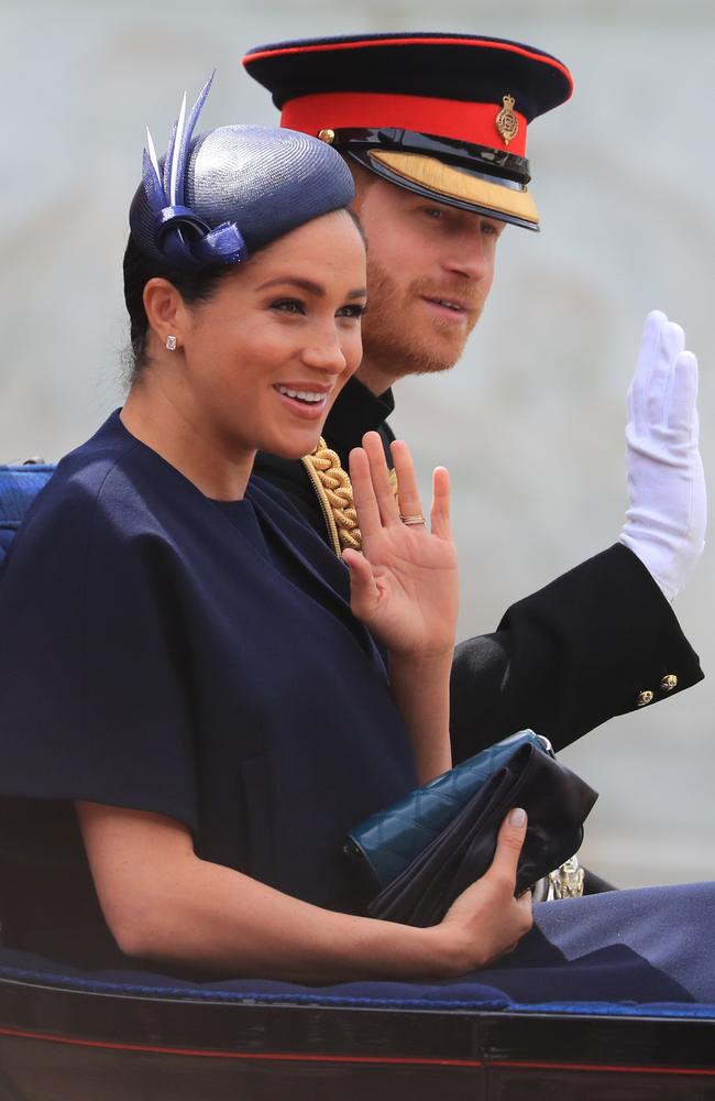 The Duke and Duchess of Sussex make their way along The Mall to Horse Guards Parade, in London, ahead of the Trooping the Colour ceremony last month. Picture: Gareth Fuller/PA Wire