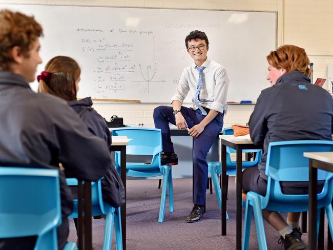 Galston High School maths teacher Jonathan Kim Sing with some of his students. Picture: Troy Snook
