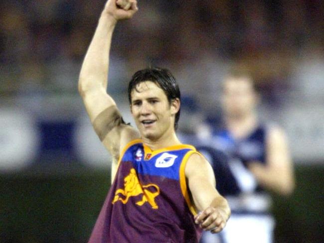 23/08/2003. Aaron Shattock celebrates. Brisbane Lions v Geelong at the Gabba.