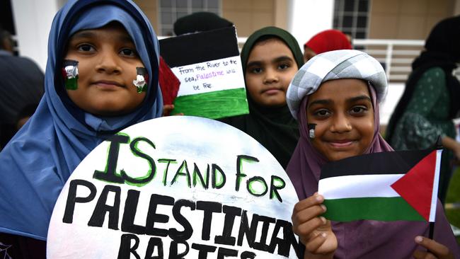 Sidrah Khan, Ayesha Fatima and Safa Khan at a pro-Palestine protest outside of the NT Parliament house on Friday October 27 calling for a ceasefire 20-days into the Gaza conflict.