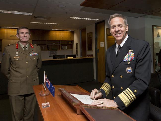 Admiral Philip Davidson, right.