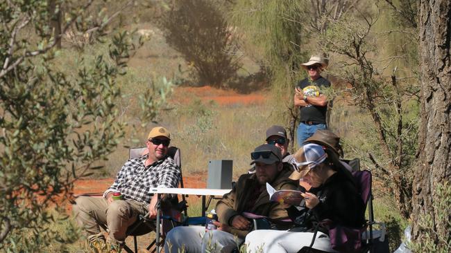 Spectators have gathered to watch competitors tackle day one of the 2024 Tatts Finke Desert Race.