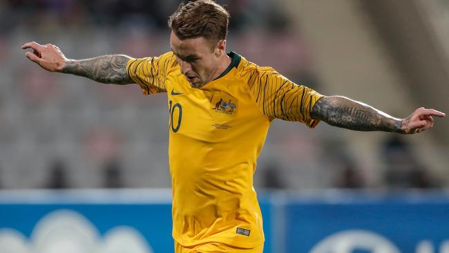 Adam Taggart celebrates his goal as Australia beat Jordan in