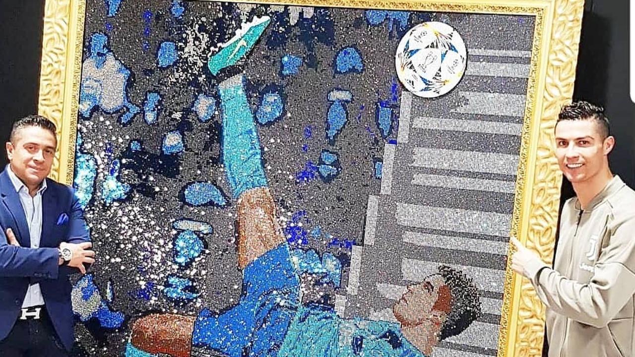 Cristiano Ronaldo Gets Giant Goal Portrait Made From Swarovski Crystals  Because of Course He Does - Sports Illustrated