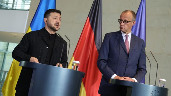 Friedrich Merz and Volodymyr Zelensky speak to the media following talks in Berlin. Picture: Getty Images