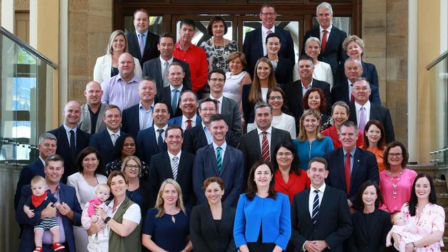 Premier Annastacia Palaszczuk and members of the 56th Parliament pose for a photograph at Parliament House. Picture: AAP/Sarah Marshall