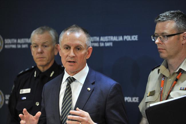 (L-R) Police Commissioner Grant Stevens, SA Premier Jay Weatherill and SA Emergency Chief Chris Beattie speak to the media during a press conference in Adelaide, Wednesday, Sept. 28, 2016. South Australia is coming back to life after severe weather damaged energy infrastructure, shutting down the entire electricity network and plunging the state into darkness. High winds are being blamed for bringing down at least 22 transmission towers in the mid-north on Wednesday with about 80,000 lightning strikes hitting the state, some damaging generation facilities. (AAP Image/David Mariuz) NO ARCHIVING. Picture: DAVID MARIUZ