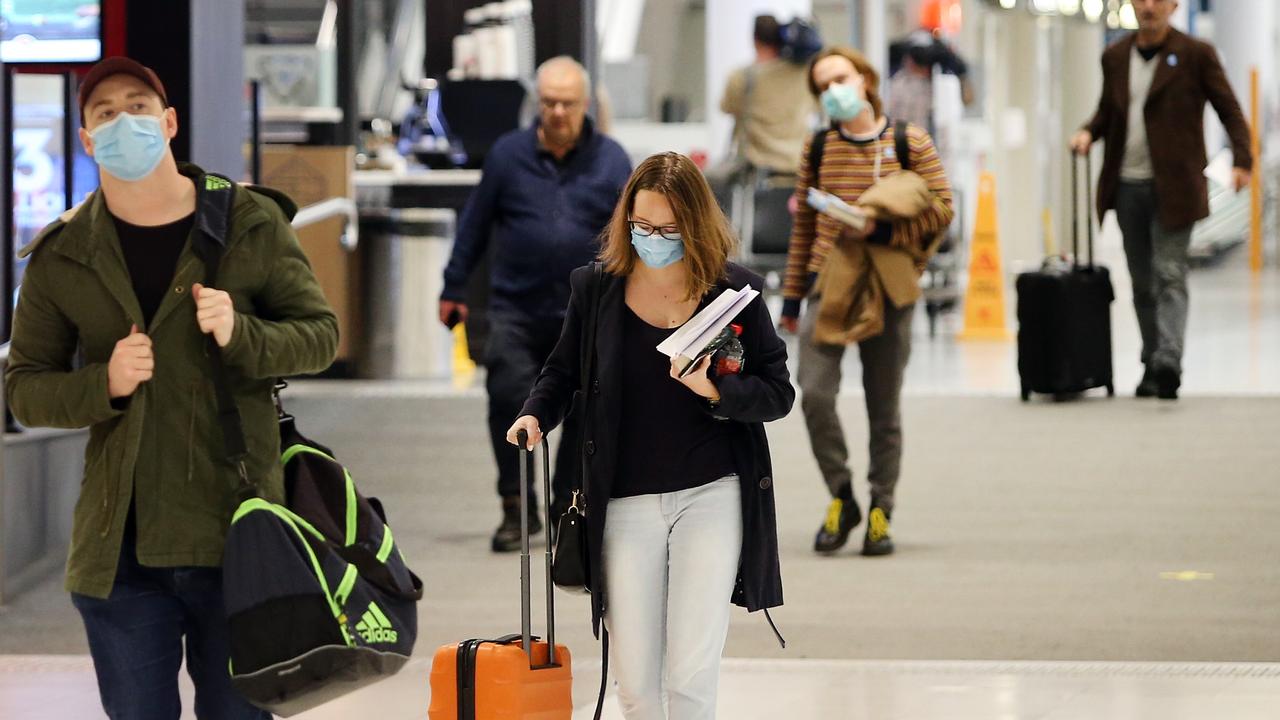 Passengers arrive in Sydney from Melbourne on a Jetstar service. Only those in transit or with special permission can now cross the NSW/Victoria border. Picture: Richard Dobson