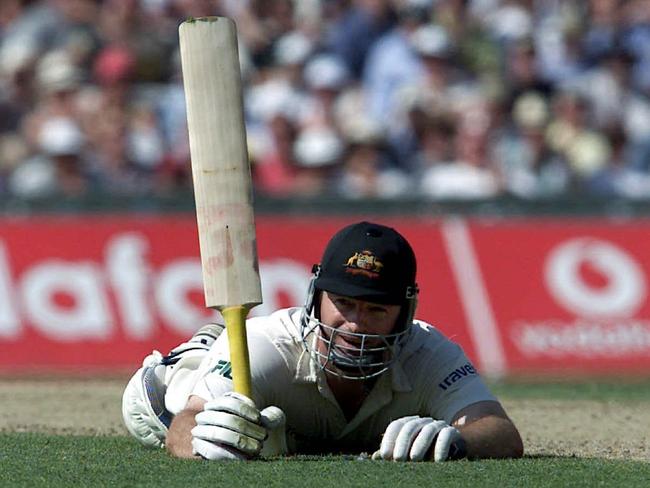 Iconic: Steve Waugh brings up his century at The Oval in the 2001 Ashes. Picture: Brett Costello