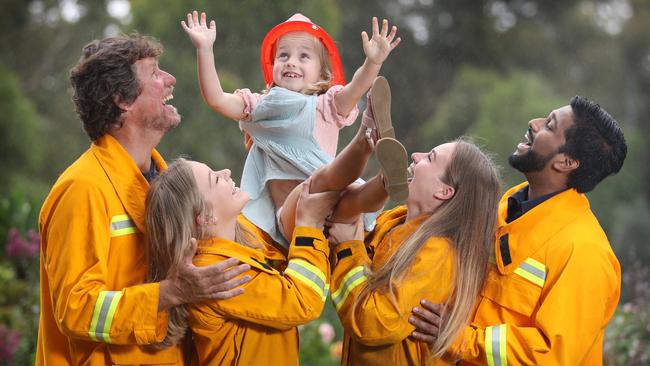 Quinnie Westwood reaches for the stars with the help of CFA members Andrew Smith, Jodie Harris, Belinda Harris and Ahmad Jahfar. Picture: Alex Coppel.