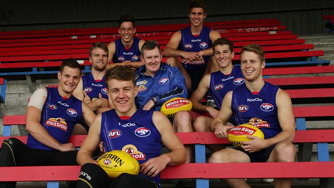 Brendan McCartney with youngsters (from left) Clay Smith, Jack Stringer, Nathan Hrovat, Jack Macrae, Michael Talia, Marcus Bontempelli and Lachie Hunter in 2014. Picture: Colleen Petch