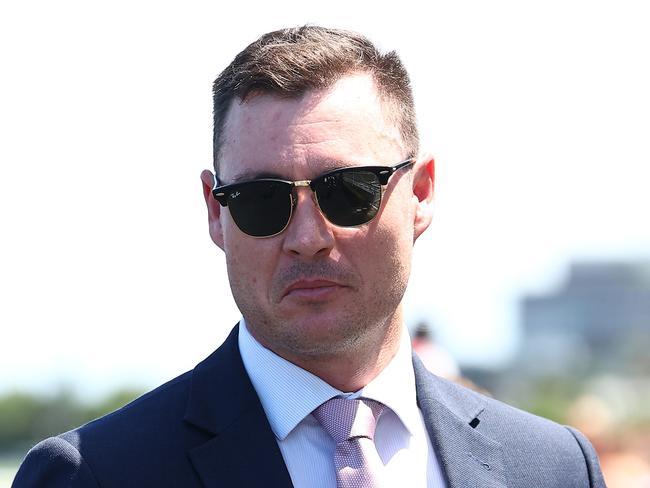 SYDNEY, AUSTRALIA - DECEMBER 23: Trainer Nathan Doyle celebrates after Chad Schofield riding Cripps Tonite wins Race 4 Midway during Sydney Racing at Royal Randwick Racecourse on December 23, 2023 in Sydney, Australia. (Photo by Jeremy Ng/Getty Images)