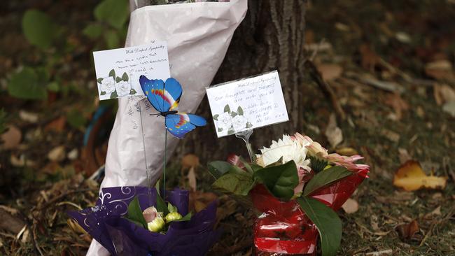 Flowers are placed outside Newmarch House today, where 12 residents have now died of coronavirus. Picture: Ryan Pierse/Getty Images)