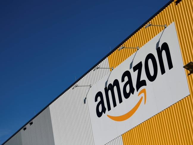 A picture taken on November 8, 2018, shows the logo of US online retail giant Amazon displayed outside the group's distribution center in Dortmund, Germany. (Photo by Ina Fassbender / dpa / AFP) / Germany OUT