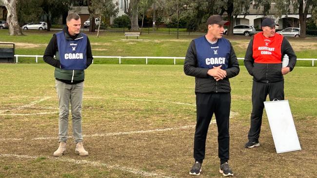 Glen Iris under 16s coach Luke Darcy opposite Ivanhoe’s Anthony Koutoufides and Sav Rocca. Picture: Supplied