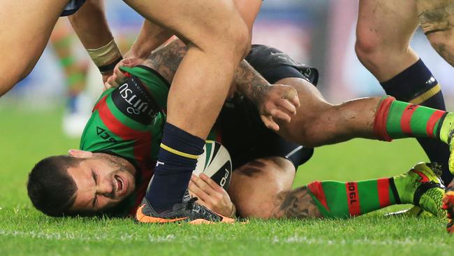 Adam Reynolds , injured, during the South Sydney Rabbitohs v North Queensland Cowboys round 24 NRL game at ANZ Stadium, Homebush. pic Mark Evans