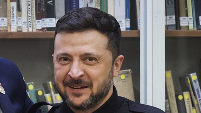 In this handout photograph taken and released by the Ukrainian Presidential Press Service on June 2, 2025, Ukraine's President Volodymyr Zelensky (R) and Poland's President Andrzej Duda (L) pose for a photo during their meeting on the sidelines of the Vilnius Summit in Vilnius, amid the Russian invasion of Ukraine. (Photo by Handout / UKRAINIAN PRESIDENTIAL PRESS SERVICE / AFP) / RESTRICTED TO EDITORIAL USE - MANDATORY CREDIT 