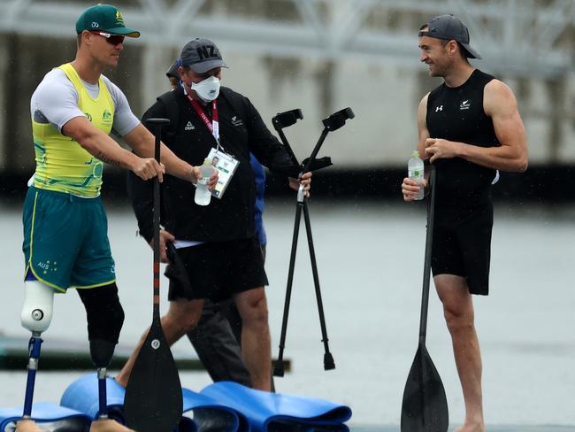 Curtis McGrath of Team Australia and Scott Martlew of Team New Zealand speak after they compete in the Men's Kayak Single 200m – KL2 at the Tokyo 2020 Paralympic Games. Picture: Dean Mouhtaropoulos/Getty Images