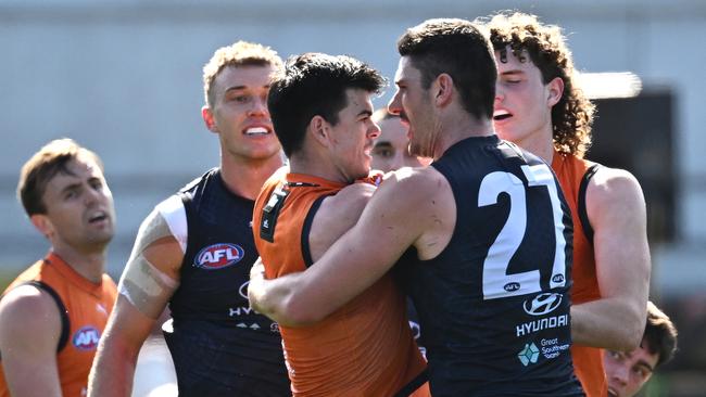 MELBOURNE, AUSTRALIA - SEPTEMBER 02: Matthew Kennedy and Marc Pittonet of the Blues have a push and shove during match simulation at a Carlton Blues AFL training session at Ikon Park on September 02, 2023 in Melbourne, Australia. (Photo by Quinn Rooney/Getty Images)