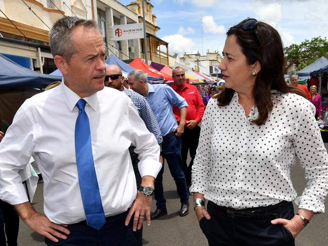 ALP federal Opposition Leader, Bill Shorten (left) and Queensland Premier Annastacia Palaszczuk (right) are seen during a street walk together in Adelaide Street in Maryborough during the Queensland Election campaign on Thursday, November 9, 2017. Premier Palaszczuk announced during her visit to Maryborough that if re-elected her government would make a $150 million commitment to protect and create new jobs in the manufacturing sector. (AAP Image/Darren England) NO ARCHIVING