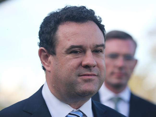 Trade Minister Stuart Ayres, with Premier Dominic Perrottet in the background. Picture: NCA Newswire / Gaye Gerard